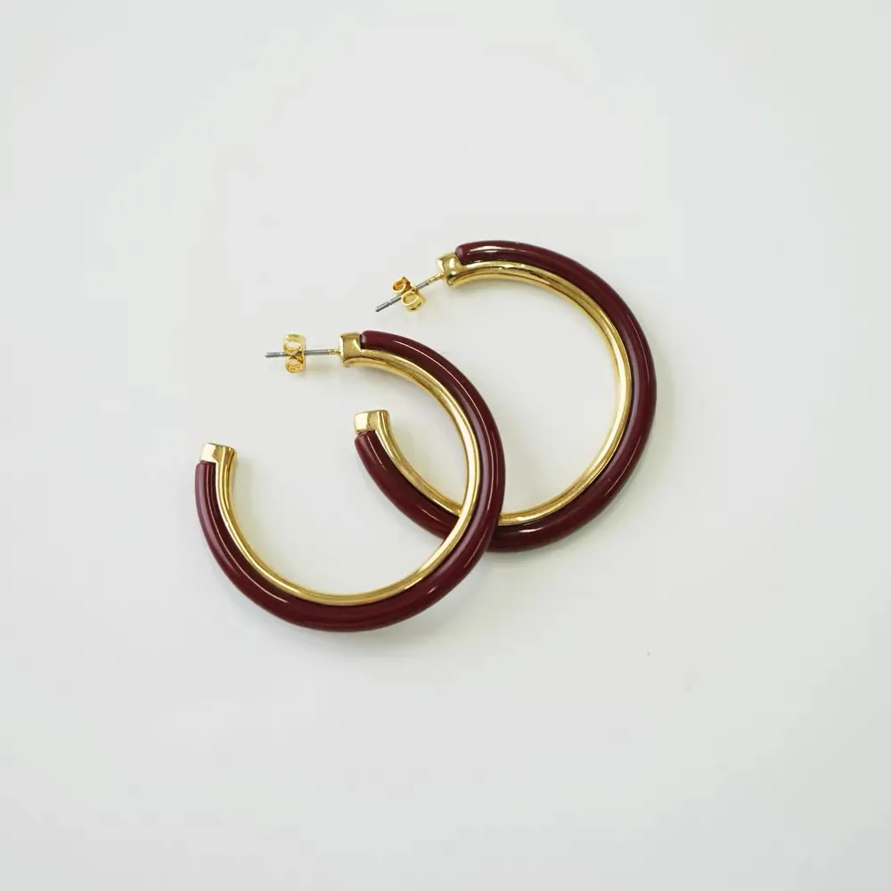 Glossy burgundy berry red C-shaped resin hoop earrings, two-tone resin and gold metal open hoops, elegant statement earrings for women
